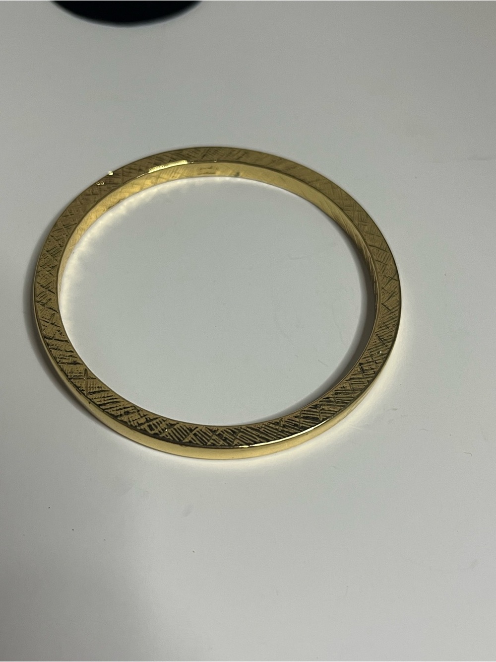Kenneth Lane stamped gold-toned bangle bracelet textured etched